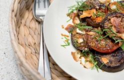 Charred tomato and eggplant salad with toasted cumin-spiced flat bread and malt vinegar dressing